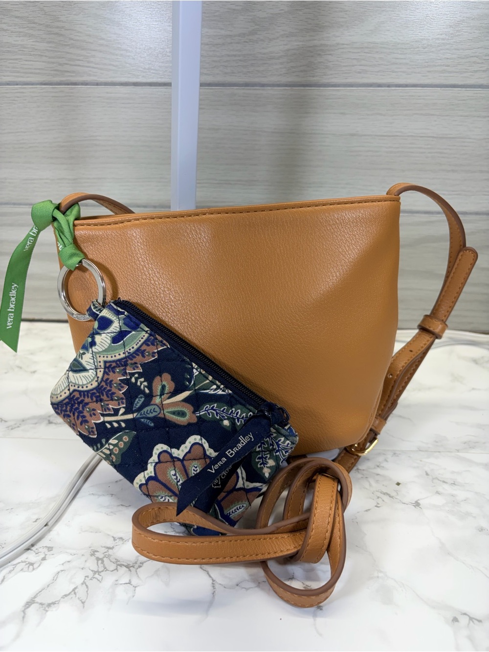 Vera Bradley Navy Floral Pouch and tan crossbody